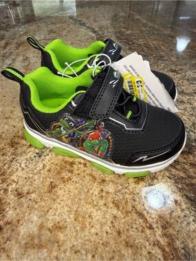 Target Black and Lime Green Kids Sneakers with Ninja Turtle Graphic